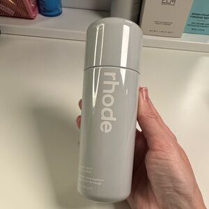 RHODE Light Gray Skincare Bottle